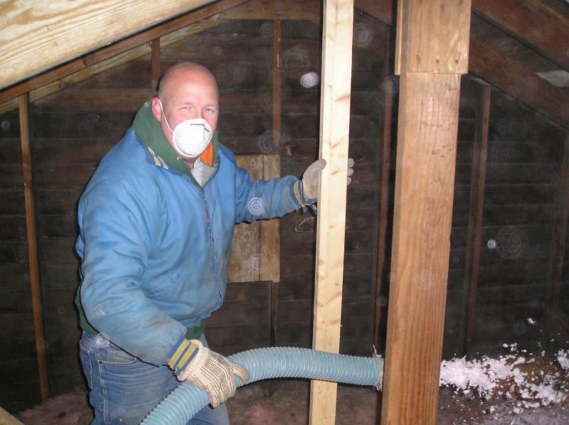 club insulation 007.JPG - Bill directing the hose